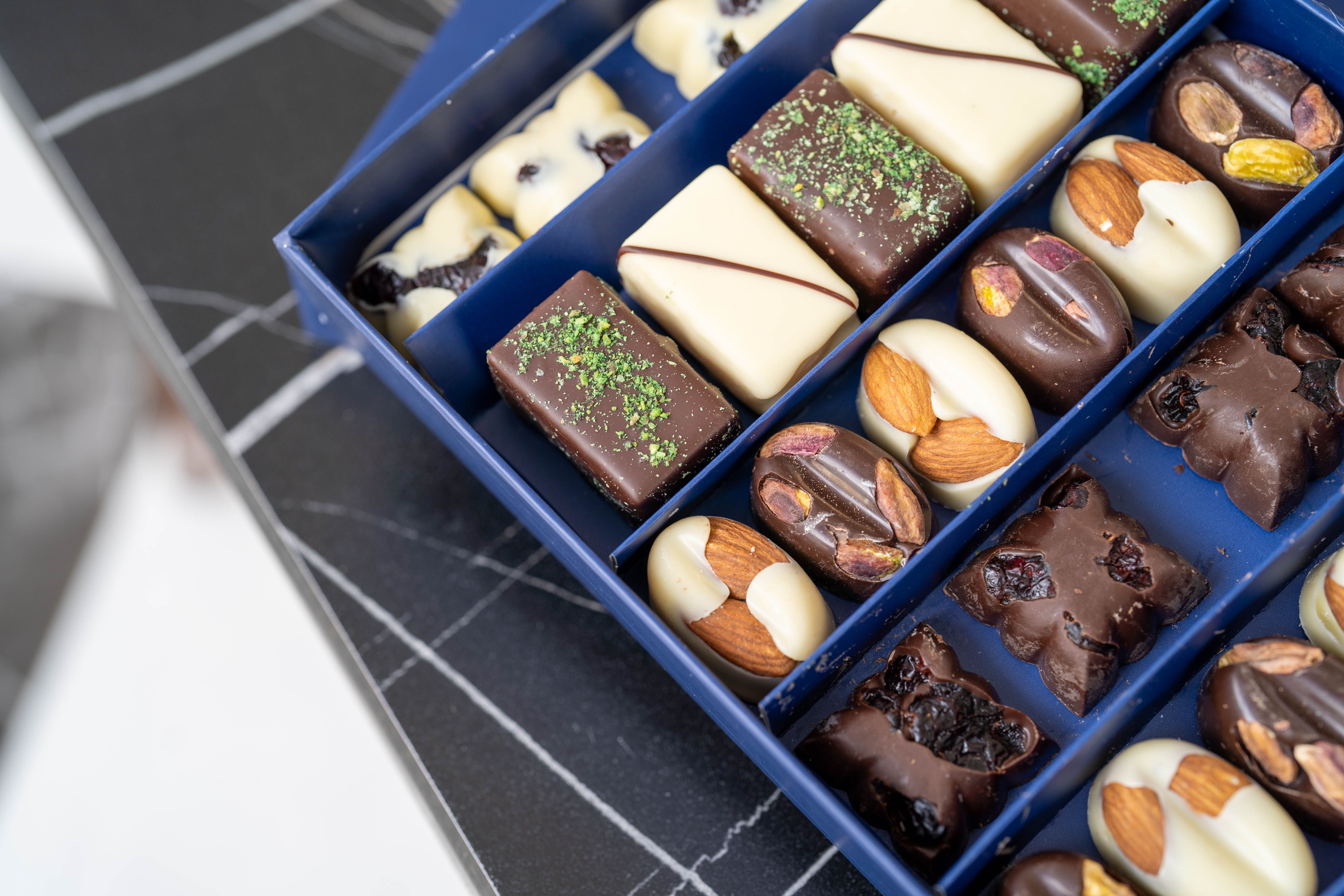 Elegant assortment of almond chocolates beautifully arranged in a box from Kahramanmaraş.