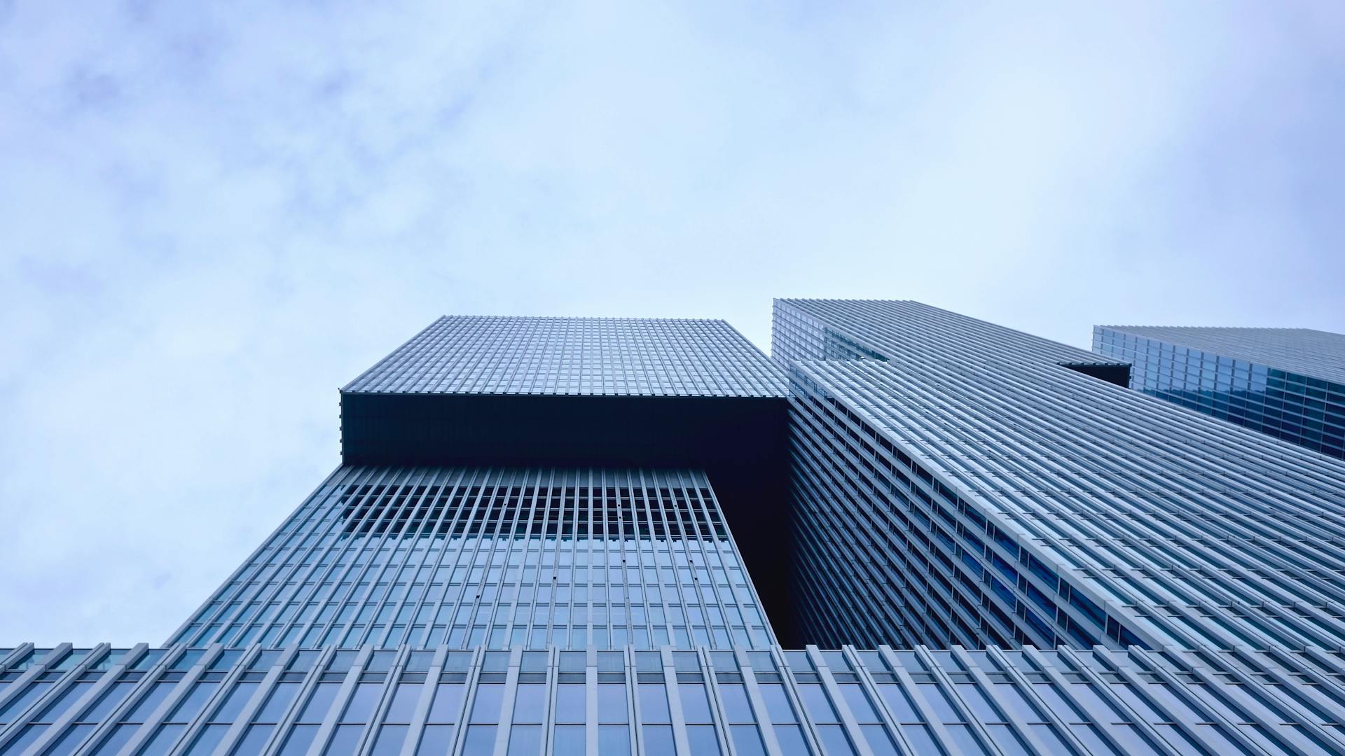 Low Angle View of Office Building Against Sky