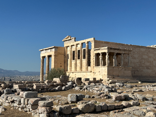 Free Erechtheion Temple with Caryatids in Athens, Greece under clear blue skies. Stock Photo