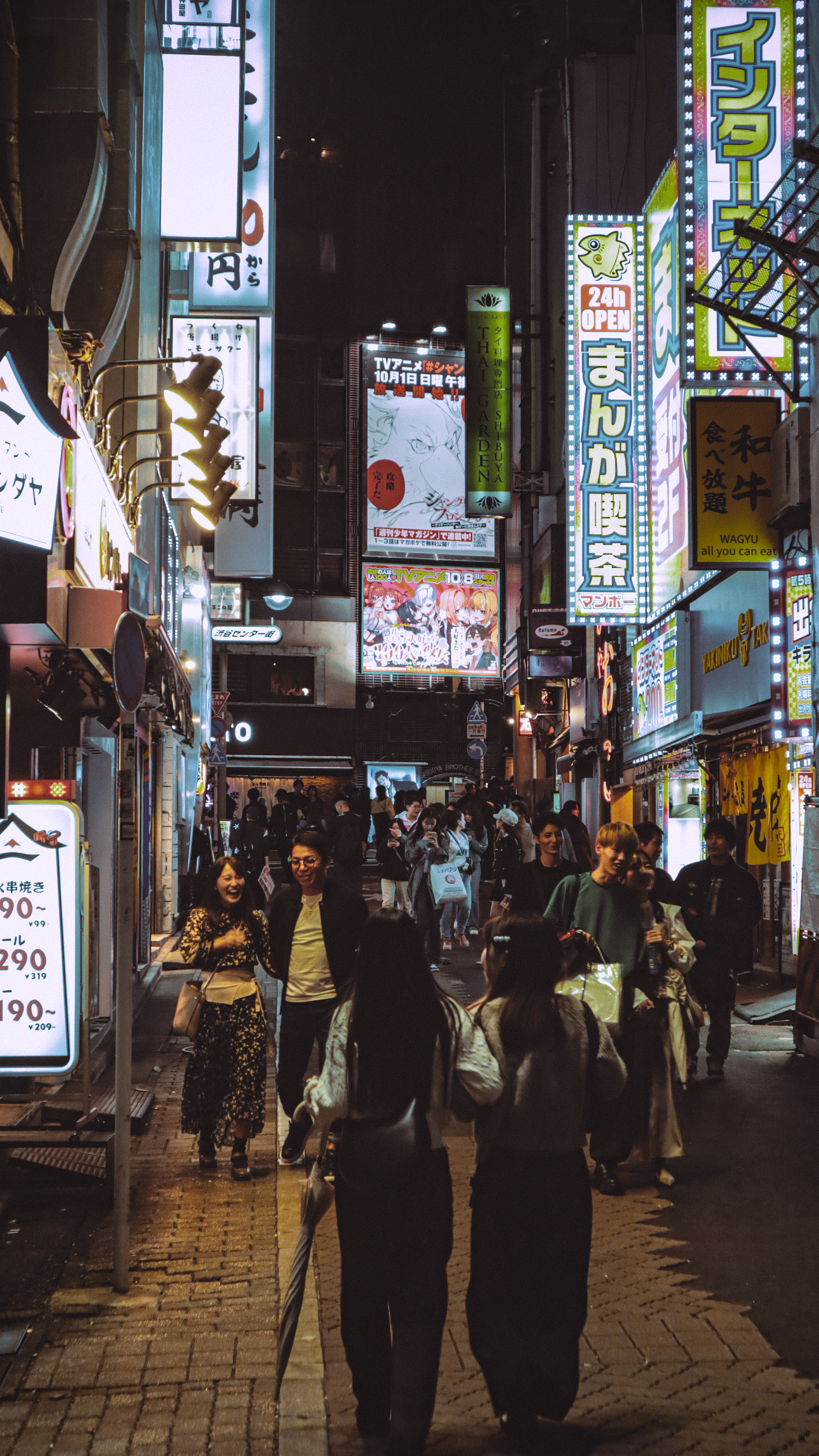 Vibrant Tokyo Nightlife on a Busy Street · Free Stock Photo
