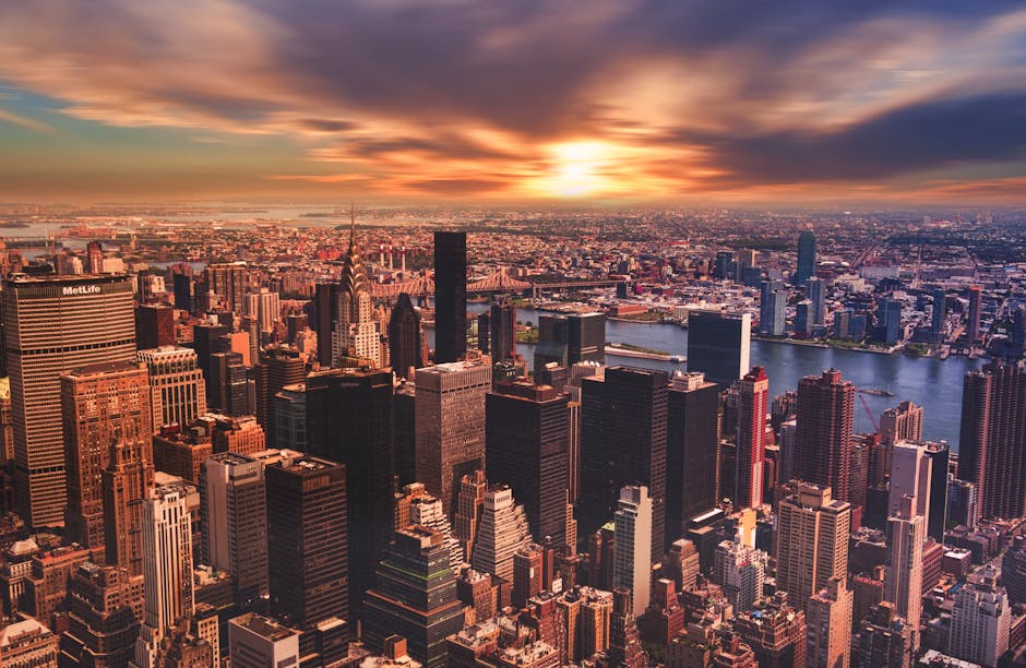 High Angle View of Cityscape Against Cloudy Sky