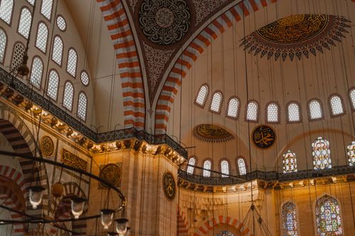 Free Majestic interior view showcasing the ornate design of Suleymaniye Mosque, Istanbul. Stock Photo