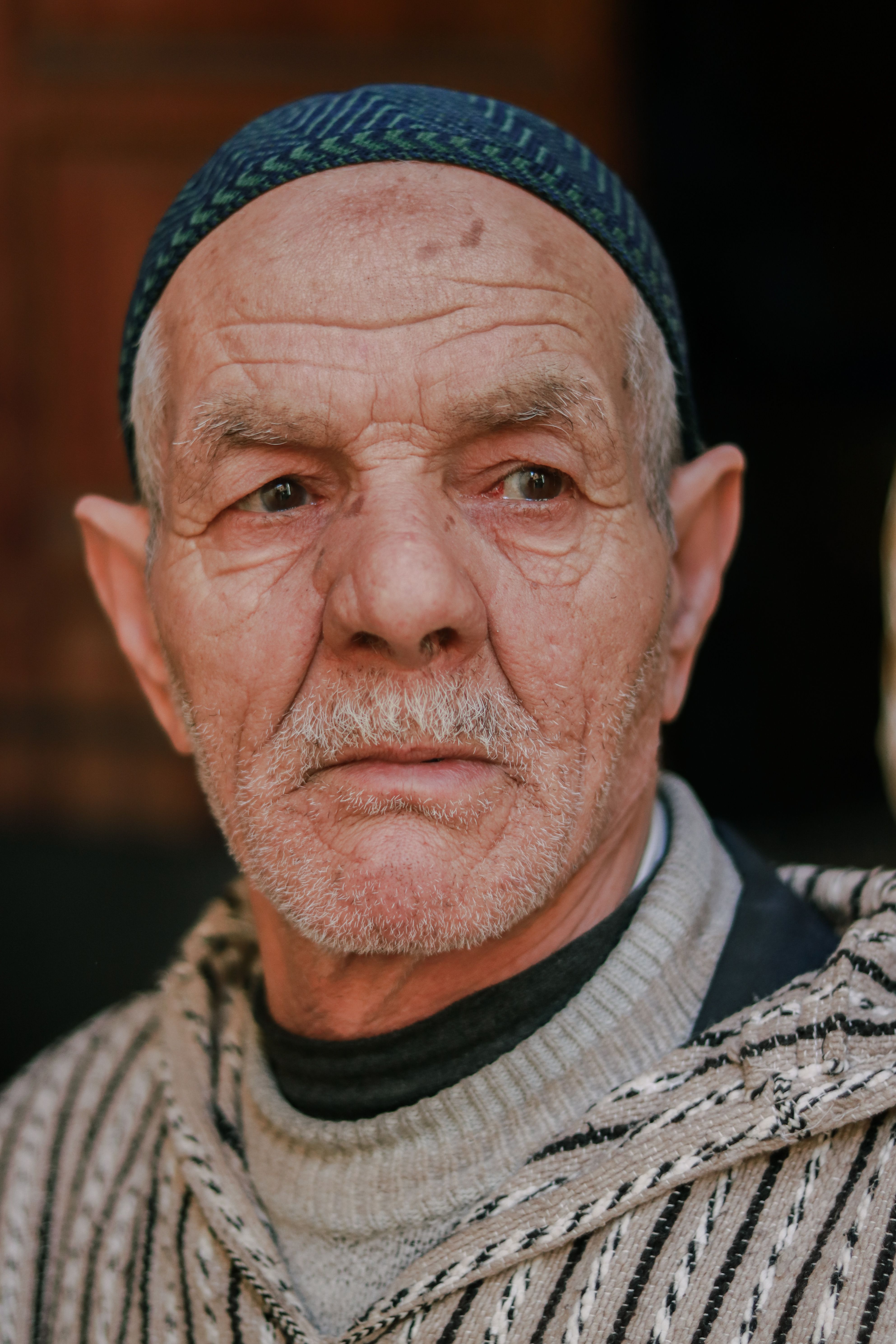 Portrait of a Senior Man in Traditional Clothing · Free Stock Photo