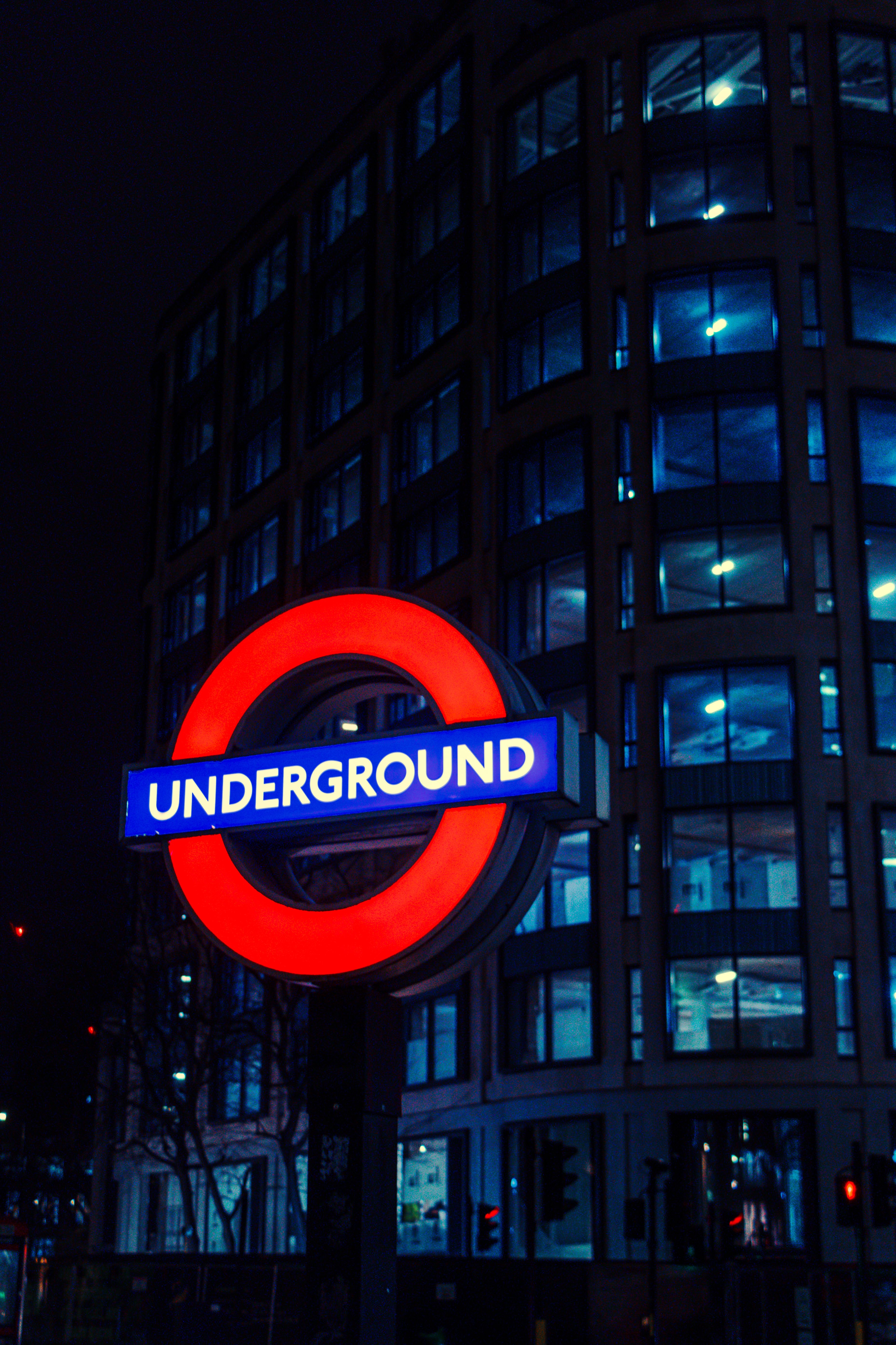 Iconic London Underground Sign at Night · Free Stock Photo