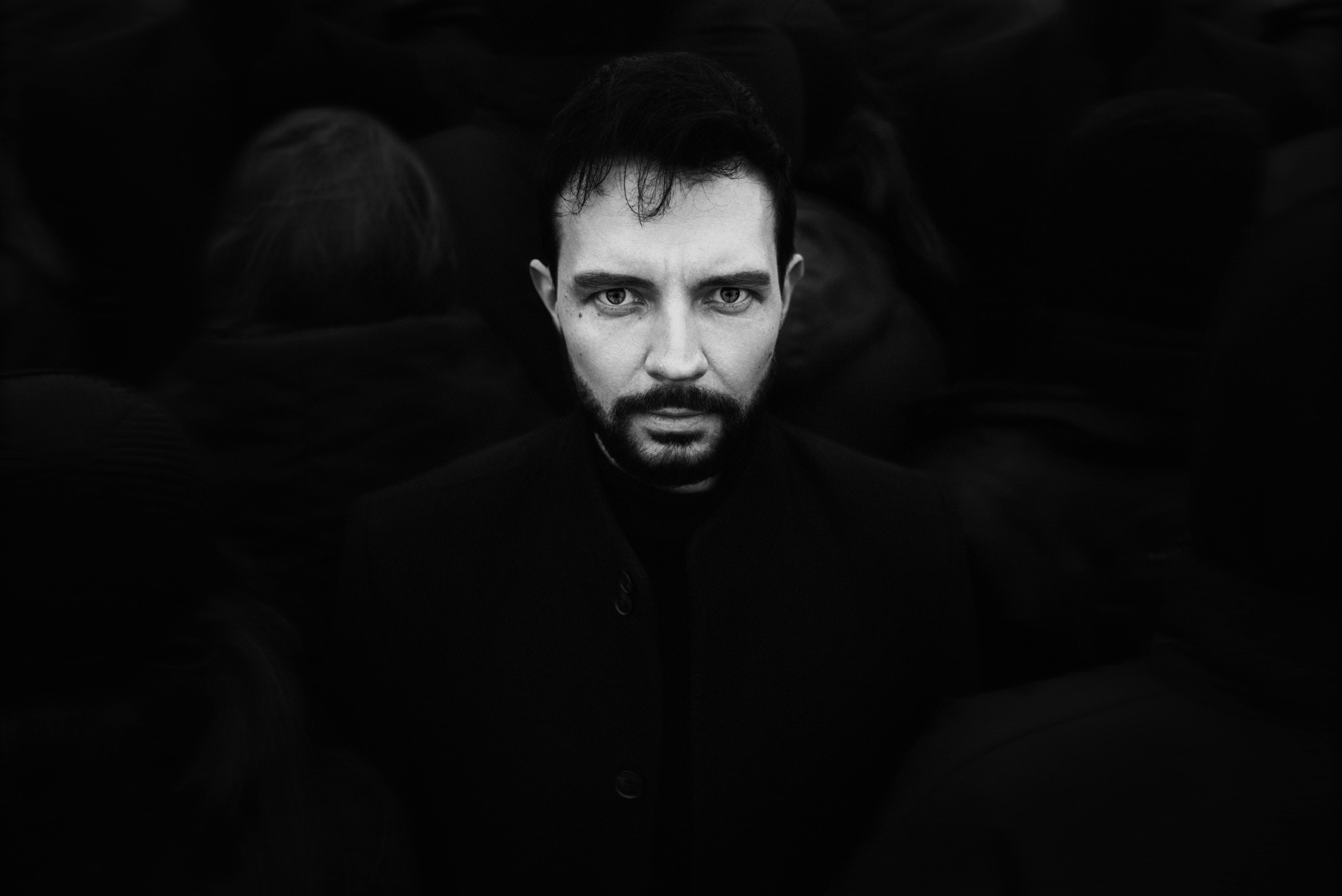 Man standing out in a crowd