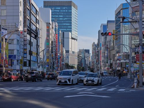 Free Dynamic scene of traffic and skyscrapers on a busy Tokyo street. Stock Photo