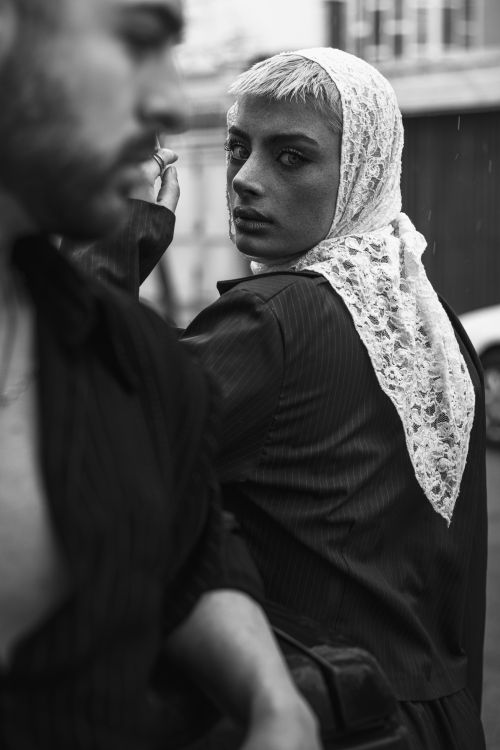 Free Dramatic black and white urban portrait of two stylish adults emphasizing mood and fashion. Stock Photo