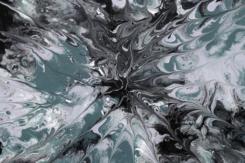 Free Dynamic abstract art composition with swirling black and green patterns creating a fluid and vibrant visual effect. Stock Photo