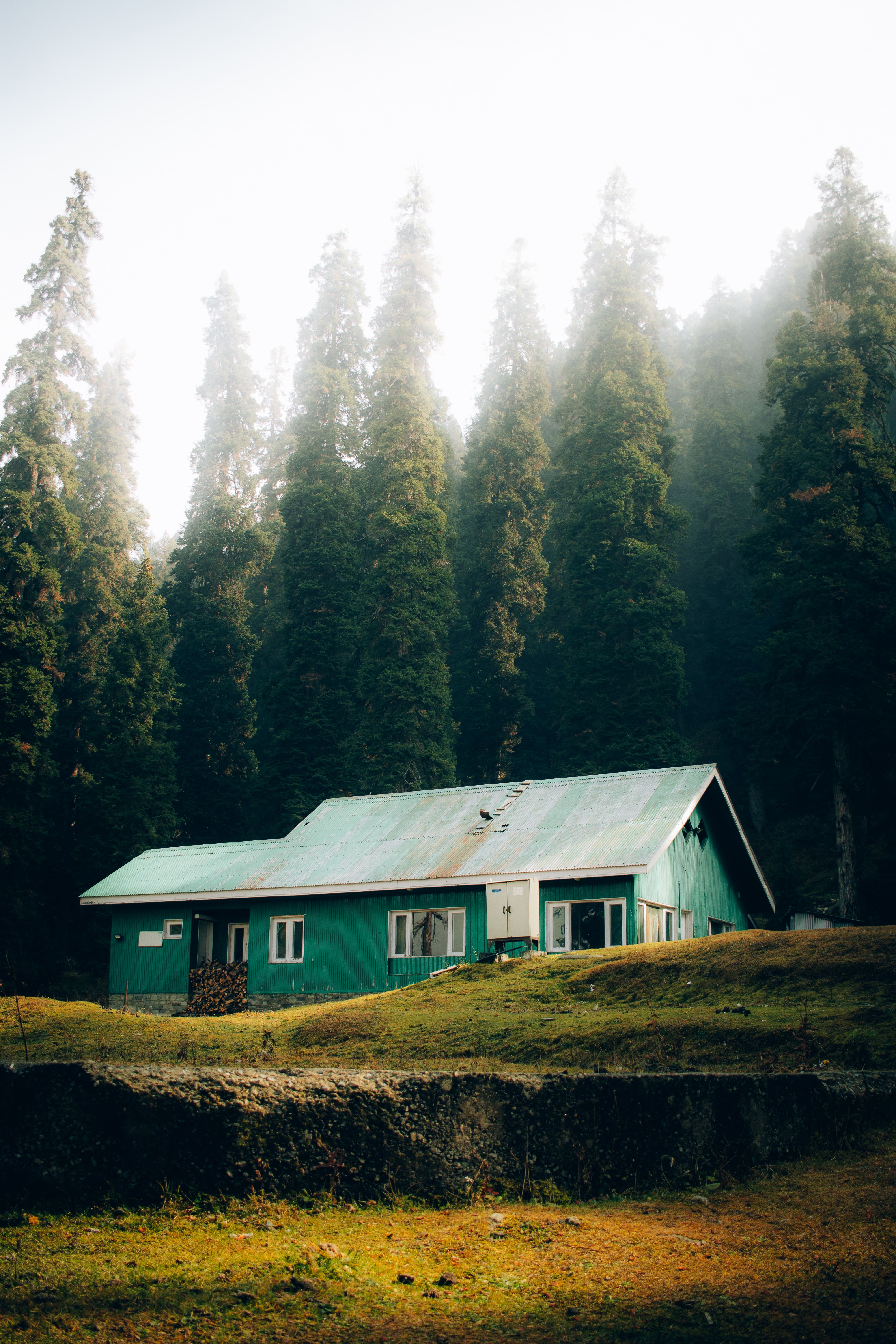 Idyllic House in Misty Mountain Landscape · Free Stock Photo