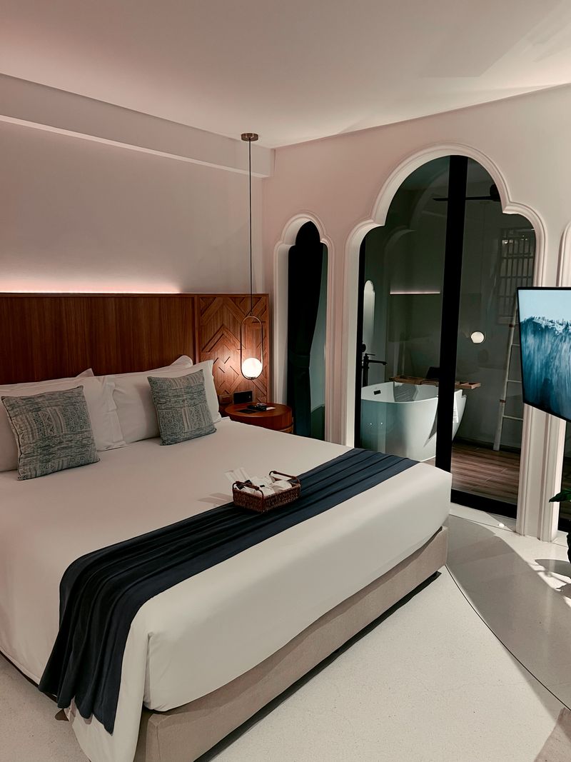 Golden Horizon Room with dark wood headboard