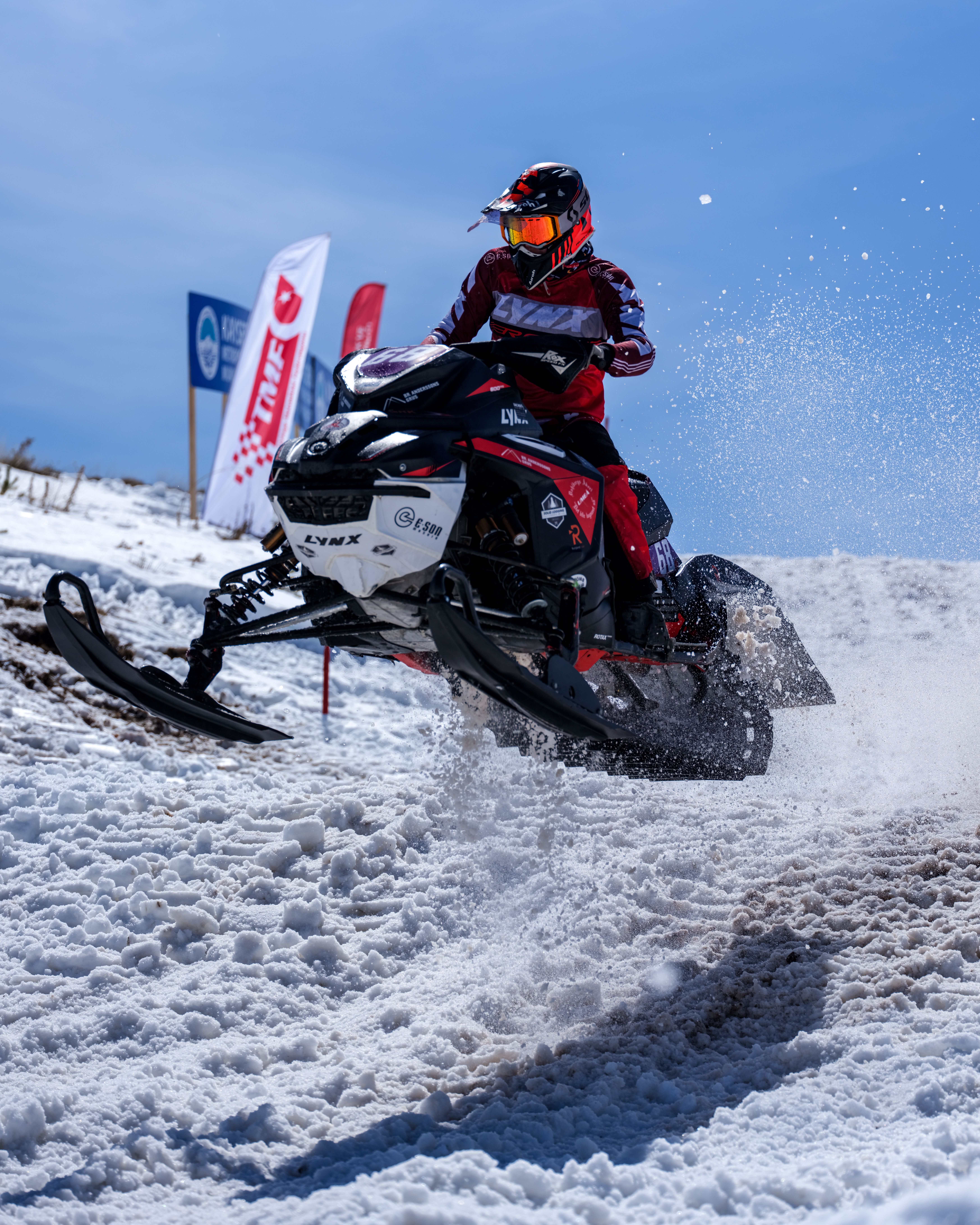 Exciting Snowmobile Jump in Winter Landscape · Free Stock Photo