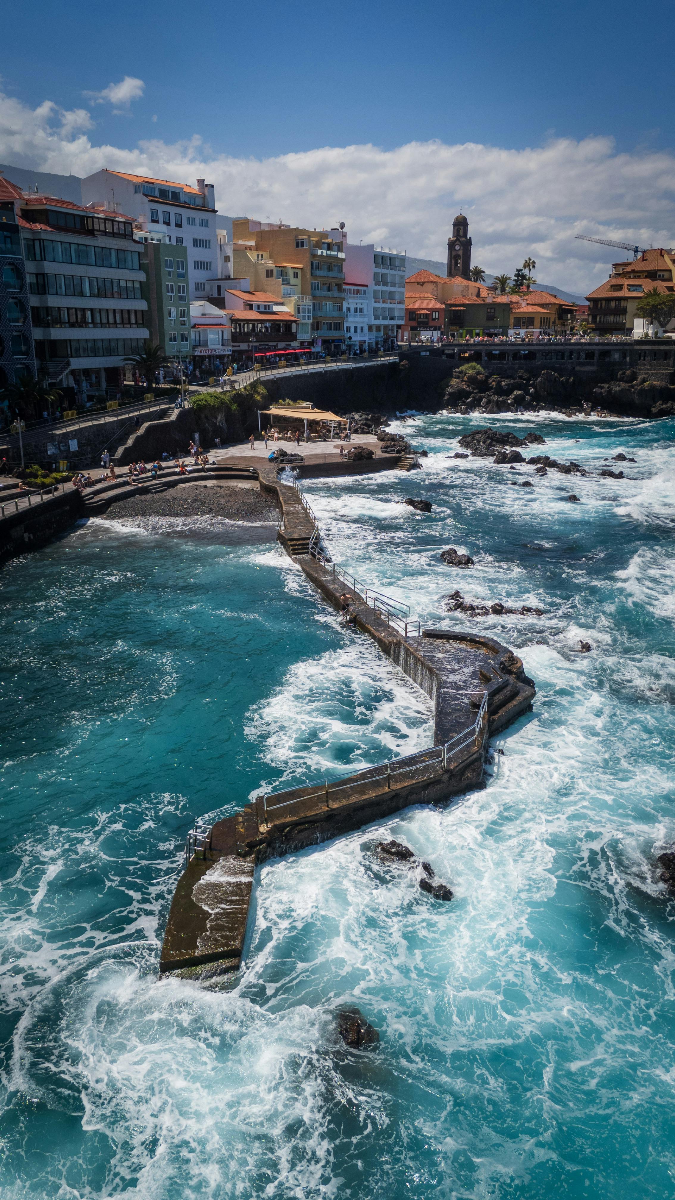Explore the scenic coast and vibrant architecture of Puerto de la Cruz, Tenerife.