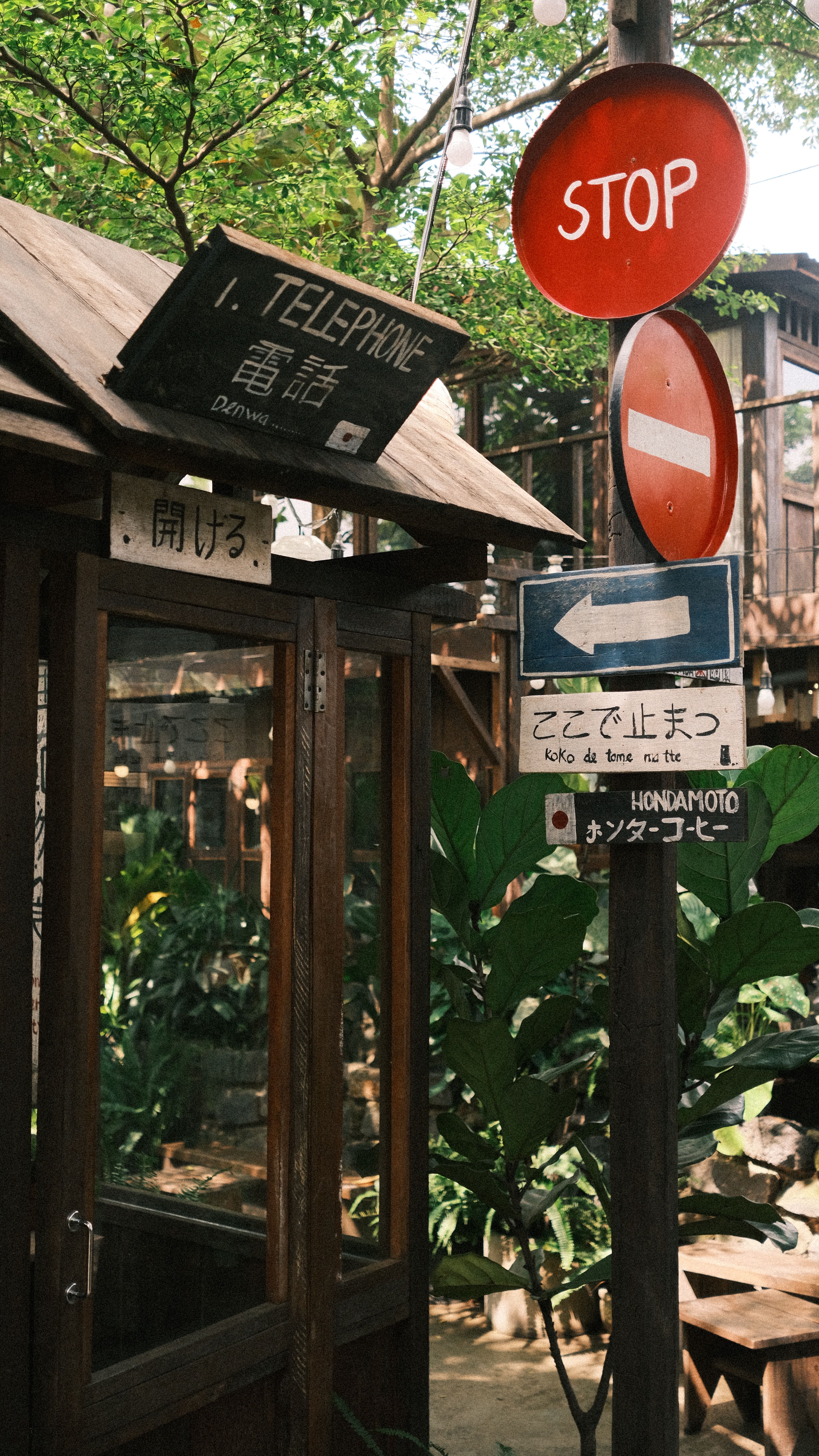 Rustic Outdoor Scene with Japanese Signage · Free Stock Photo