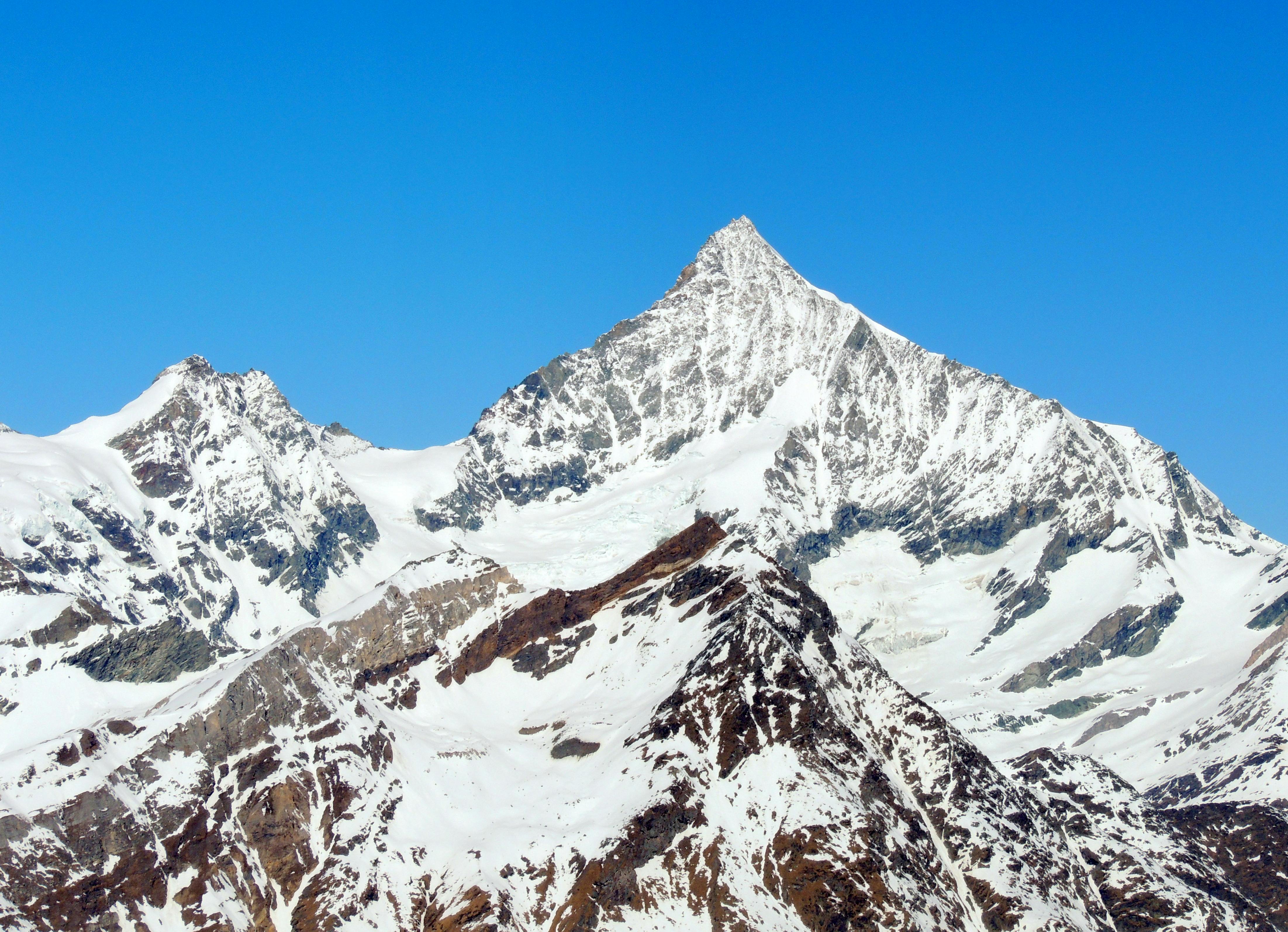 Mountain Ranges Covered in Snow · Free Stock Photo
