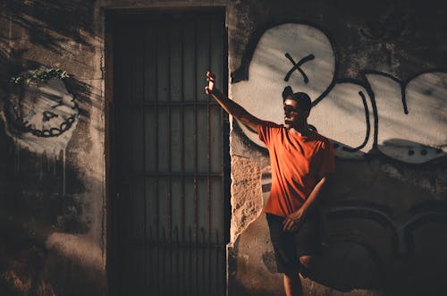 Man Wearing Orange T-Shirt