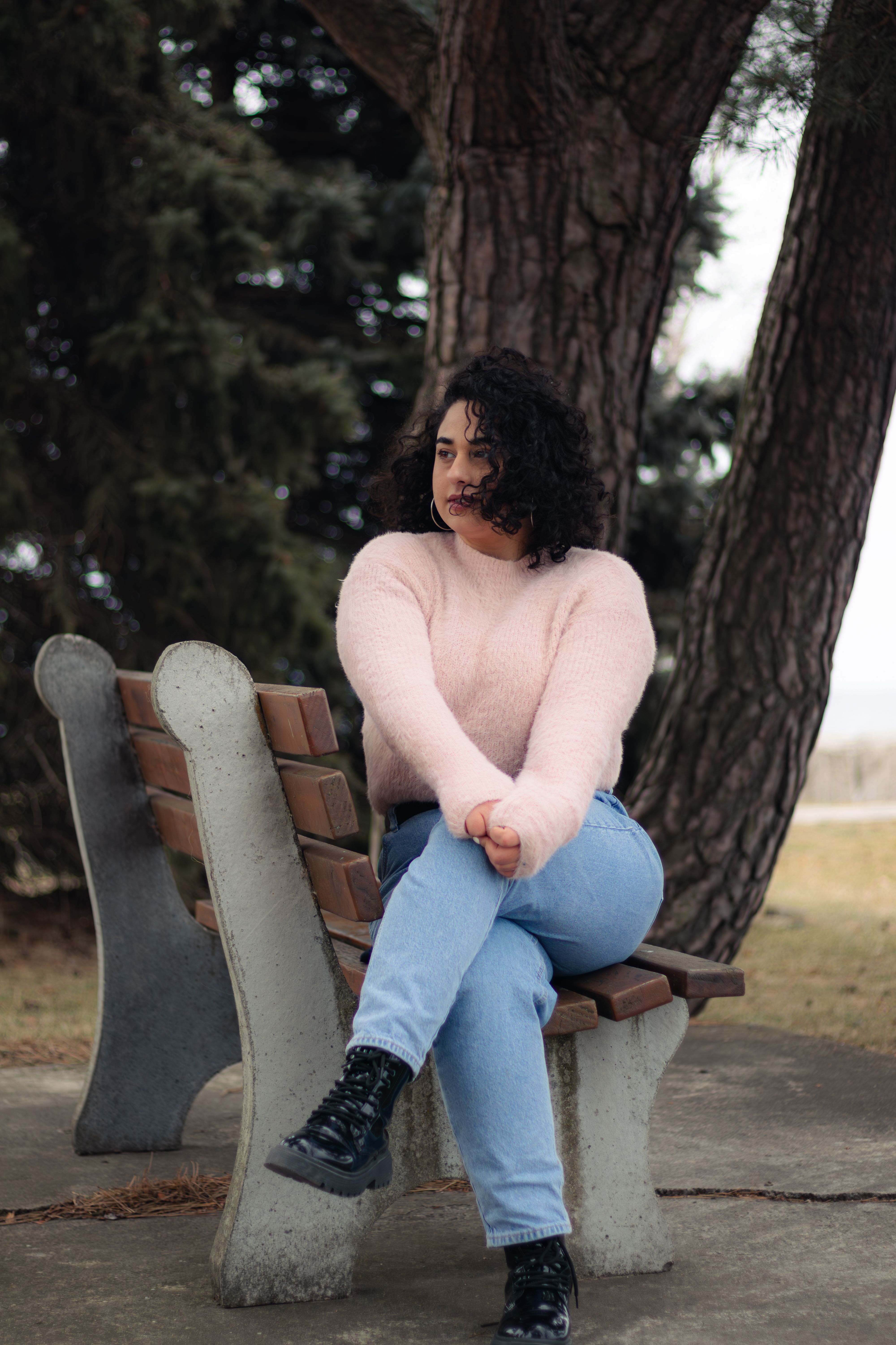 Woman Relaxing on Bench in Toronto Park · Free Stock Photo