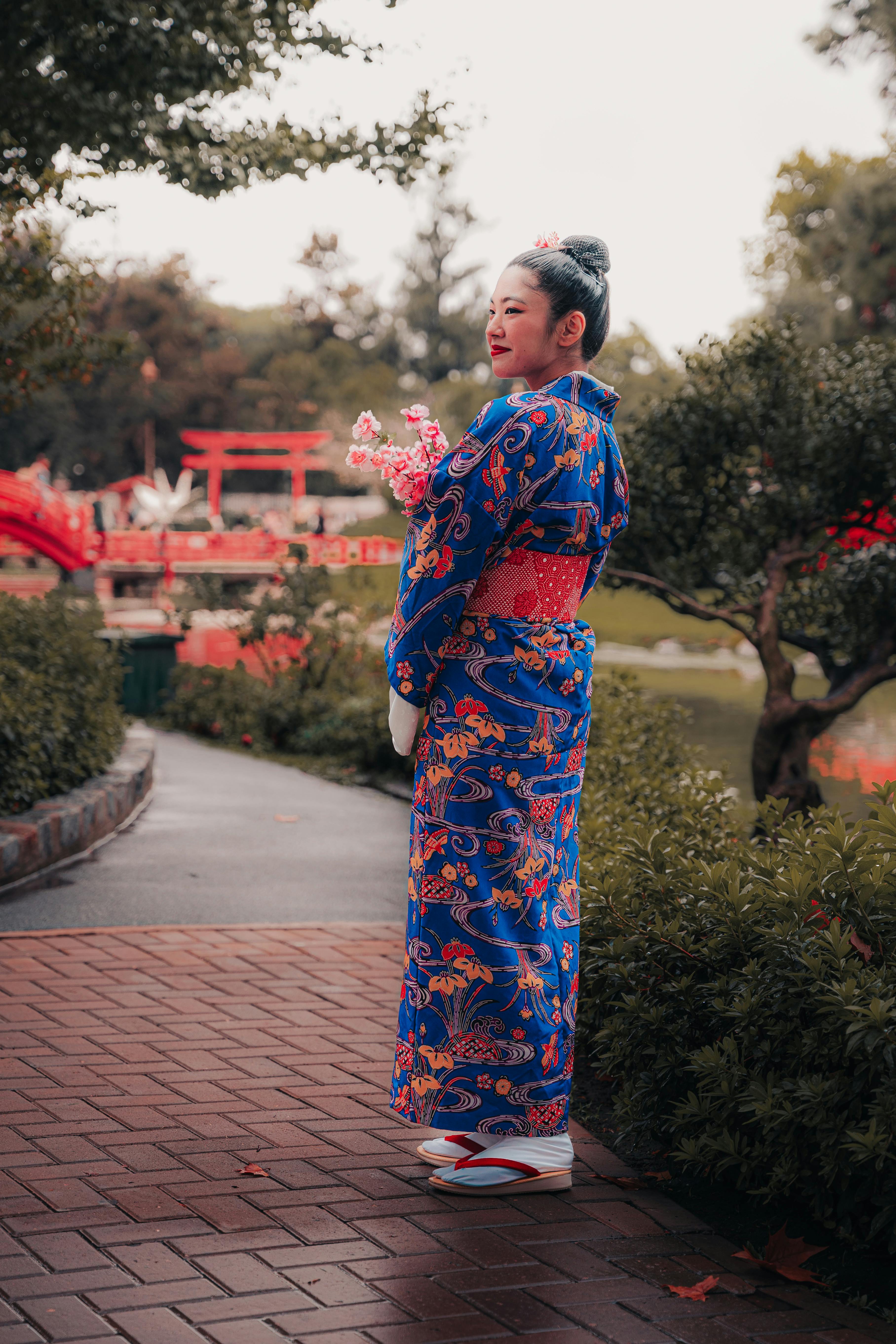 woman in kimono at traditional japanese garden
