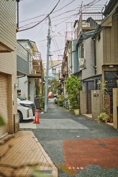 Charming residential street in Tokyo with modern architecture and urban aesthetics.
