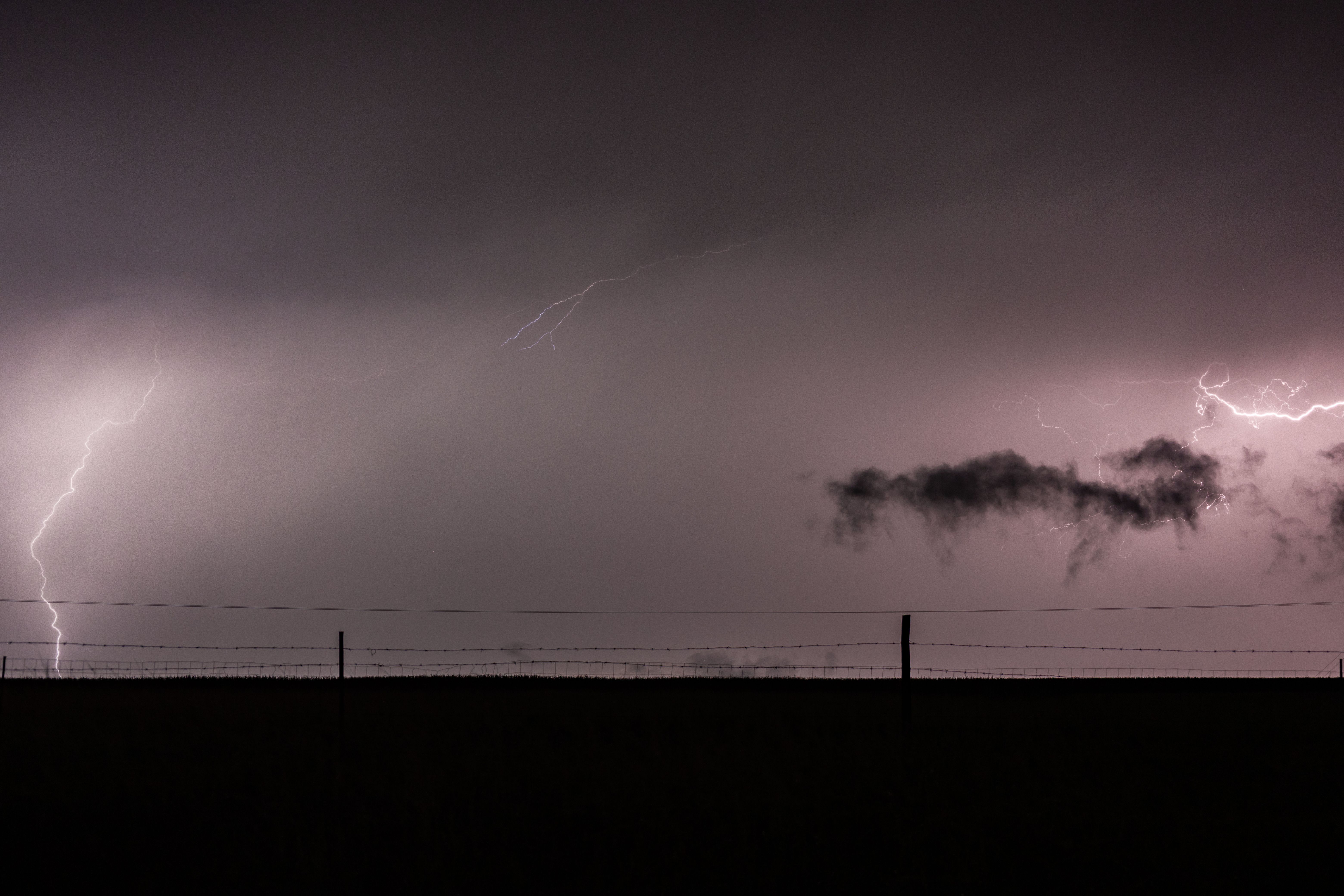 Dramatic Lightning Storm Over Rural Landscape · Free Stock Photo