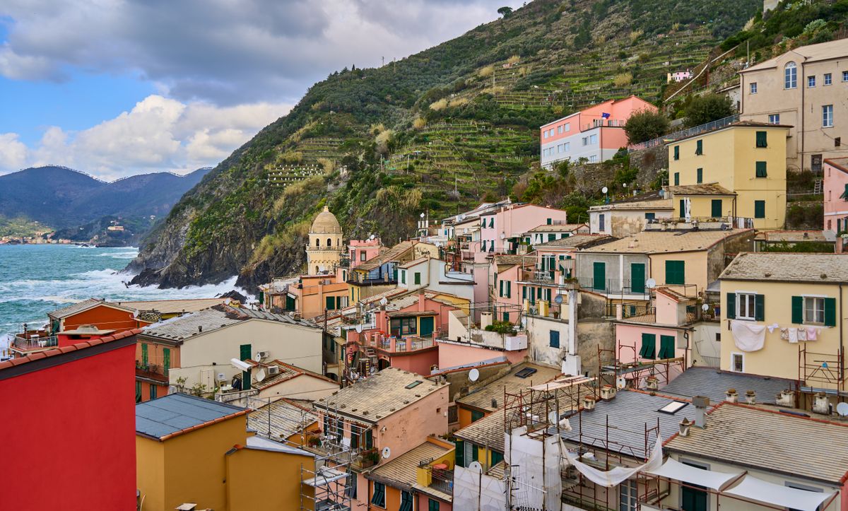 Colorful buildings of Vernazza, nestled by the sea and hillside in Cinque Terre, Italy.