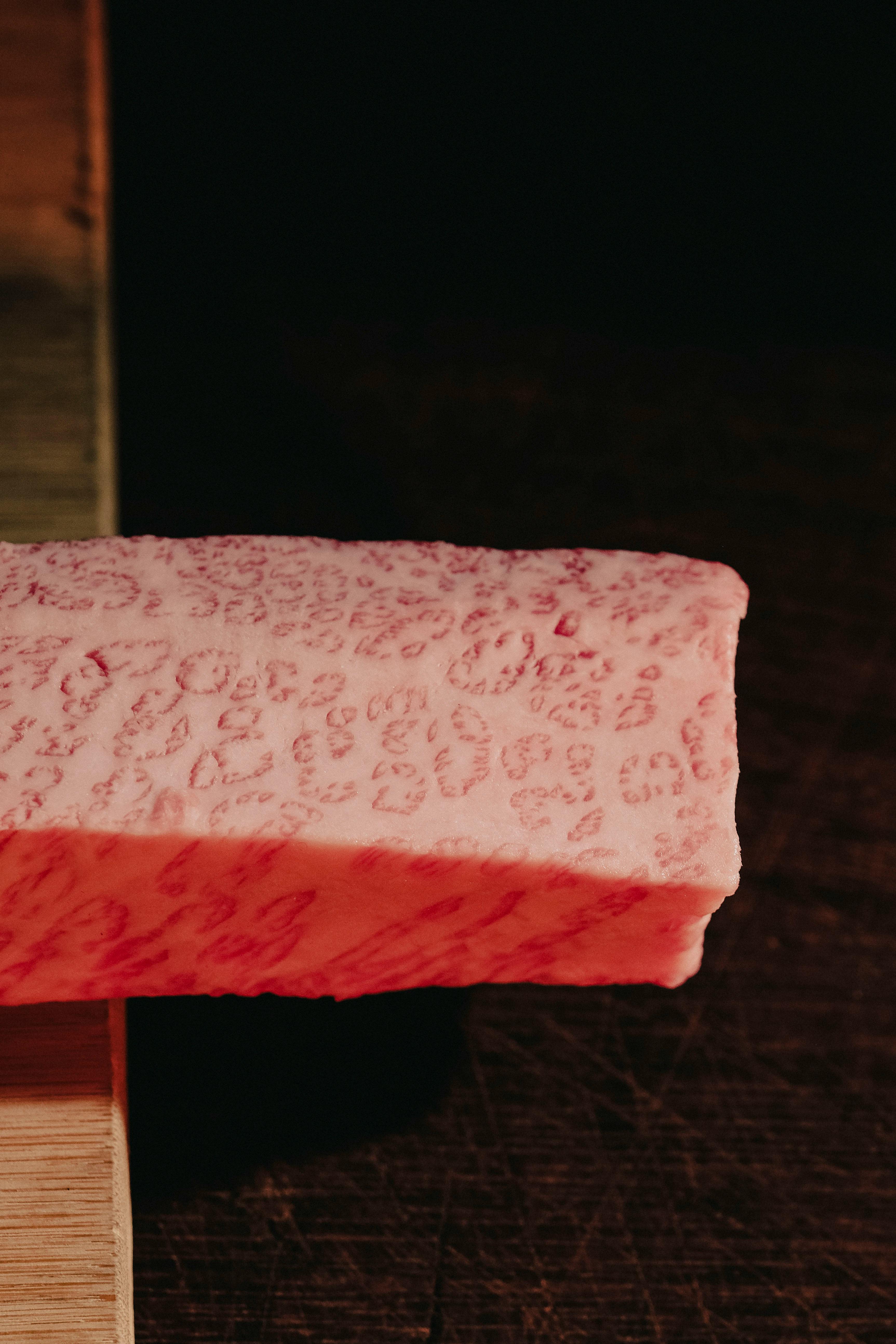 Marbled Wagyu beef with intricate fat patterns, ready for gourmet culinary preparation.