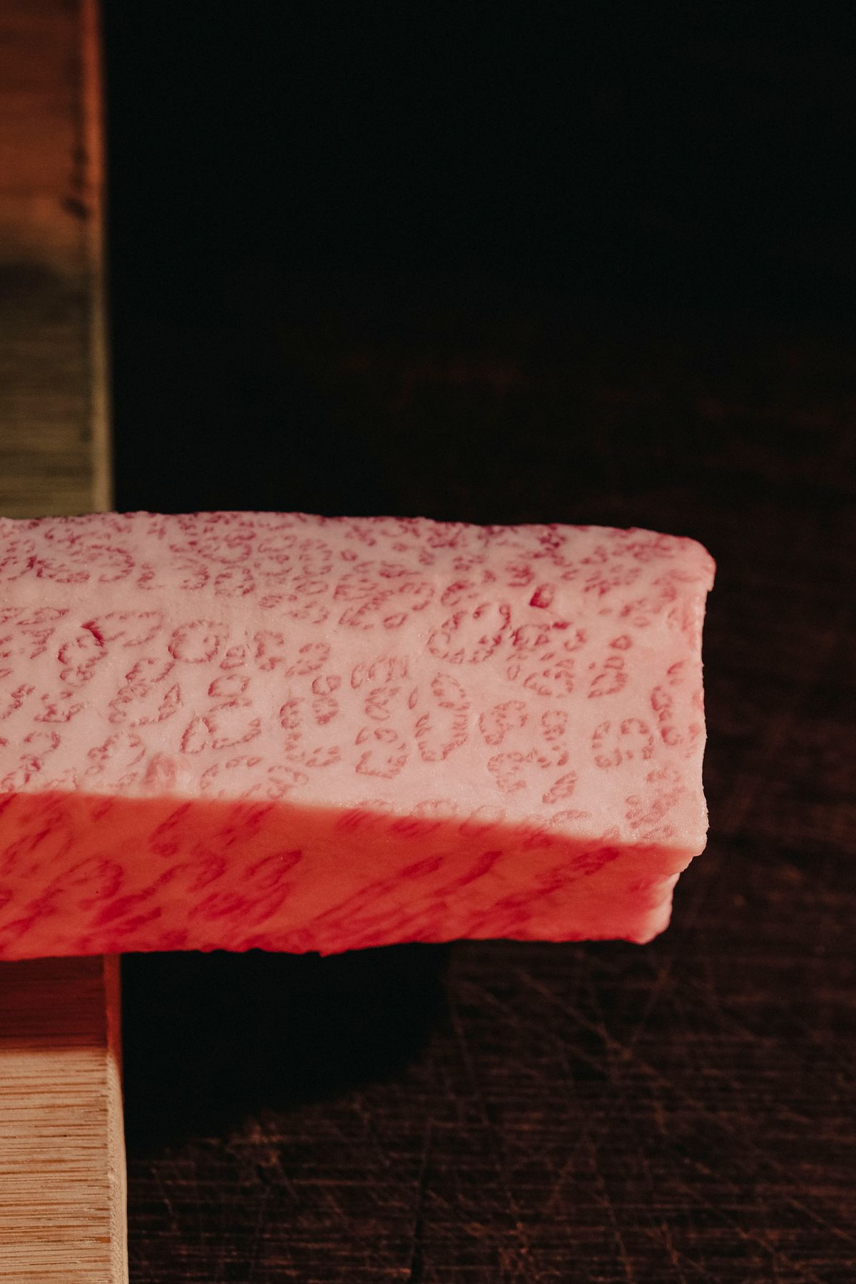 Close-up of marbled A5 Japanese wagyu beef showing intricate fat marbling patterns