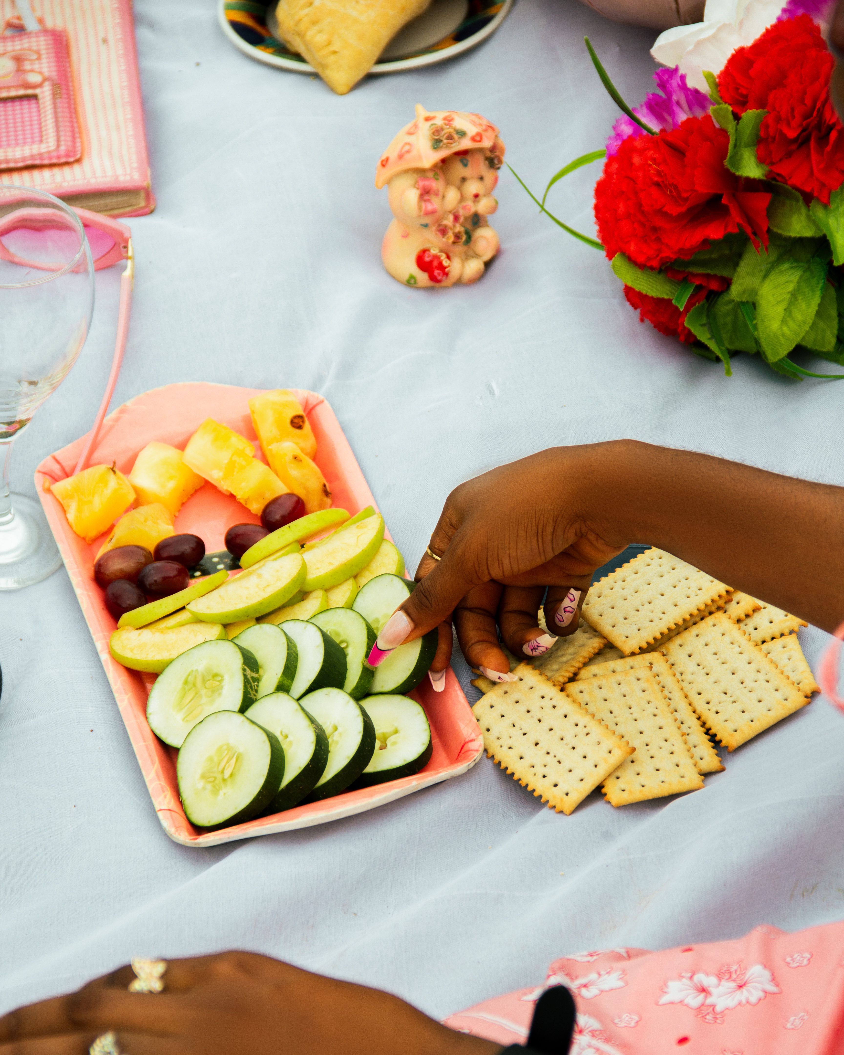 Elegant Picnic Setting with Fresh Fruits and Snacks · Free Stock Photo
