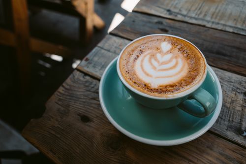Free A beautifully crafted latte with art served in a café in Baja California Sur. Stock Photo