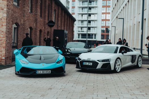 High-performance Lamborghinis and Audi R8 showcased in Cluj-Napoca, Romania.