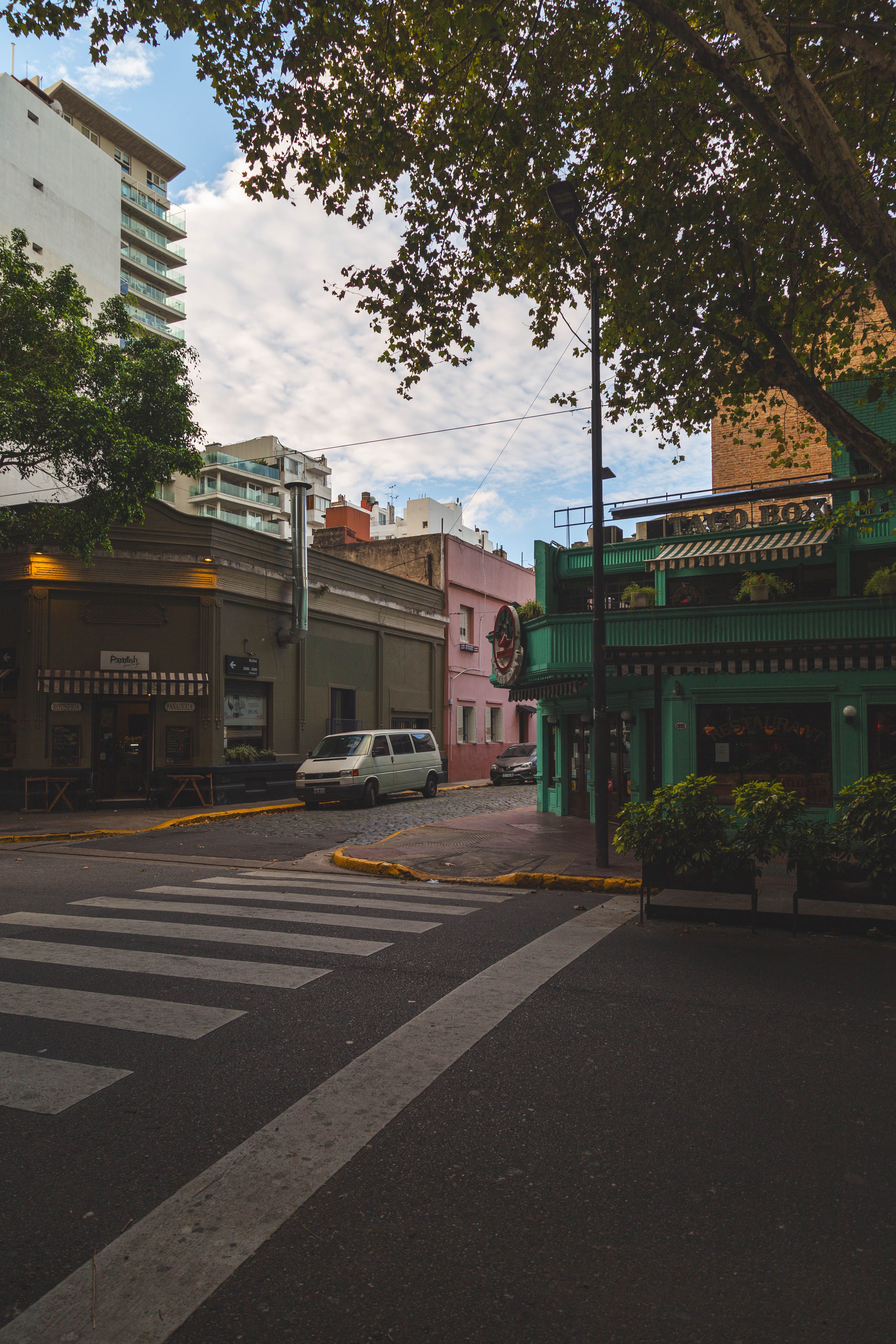 Colorful street corner in Recoleta, Buenos Aires with vibrant architecture.