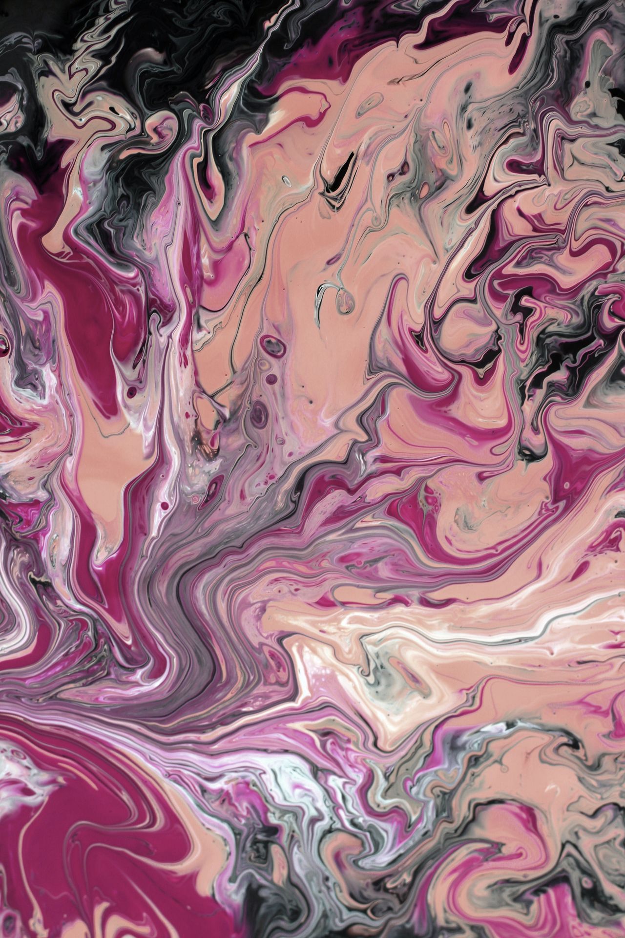 Abstract painting with pink, black, and white swirls