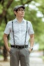 Fashionable Man in Suspenders Outdoors