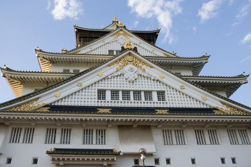 Free Close-up of the stunning Osaka Castle featuring exquisite architecture and clear blue skies. Stock Photo