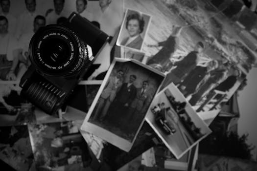 Collection of vintage photos with a retro camera, evoking nostalgia and memories.