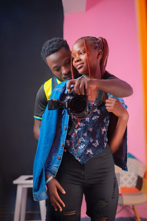 Free A joyful couple takes a selfie indoors in Bungoma, Kenya. Stock Photo
