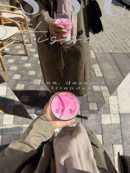 Trendy outdoor café in Istanbul featuring a vibrant pink latte, captured with stylish reflection.