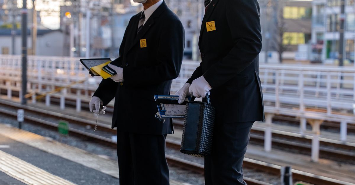 Train Assistant Train Station Workers in Uniform with Safety Masks · Free Stock Photo