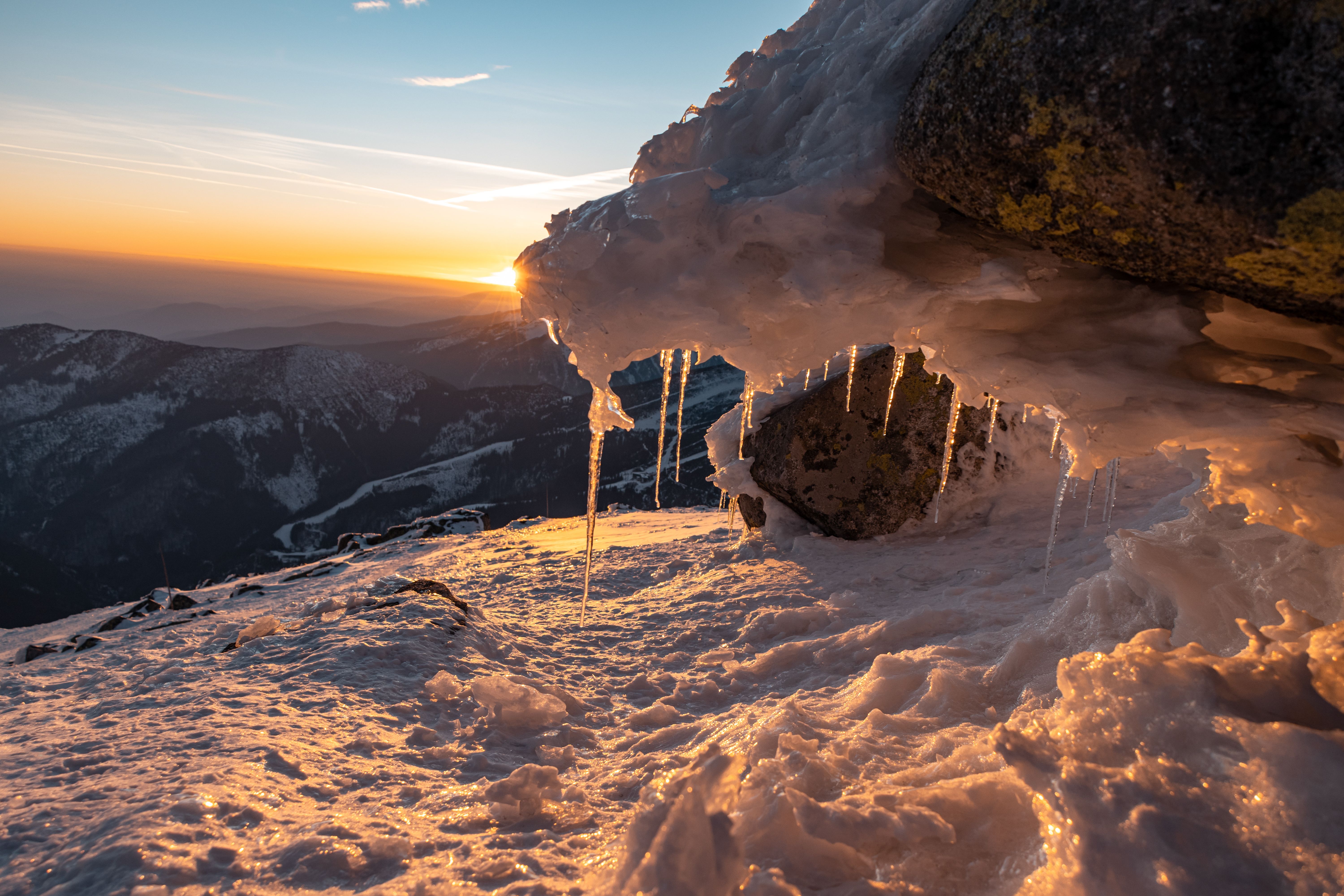 Breathtaking Winter Sunrise Over Frosty Mountains · Free Stock Photo