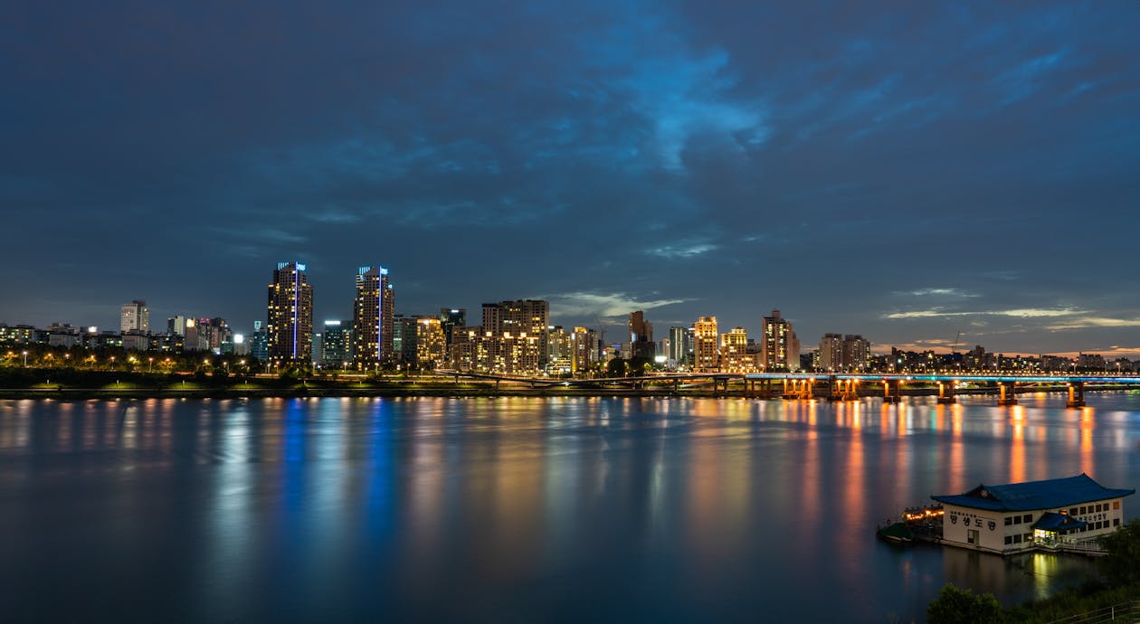 City Skyline Under Cloudy Sky