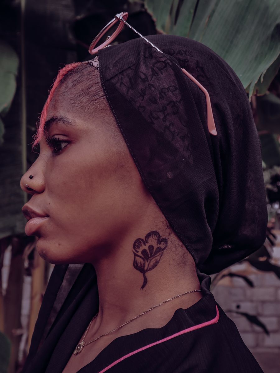 Neck tattoo and jewellery styling