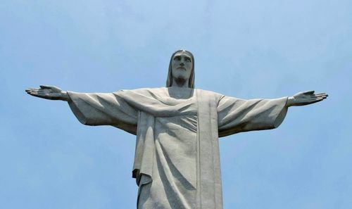 Free Majestic view of the Christ the Redeemer statue against a clear sky in Rio de Janeiro. Stock Photo