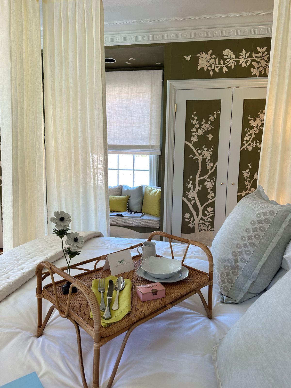 Breakfast tray with coffee and pastries served on a bed the morning after a Valentine's night in