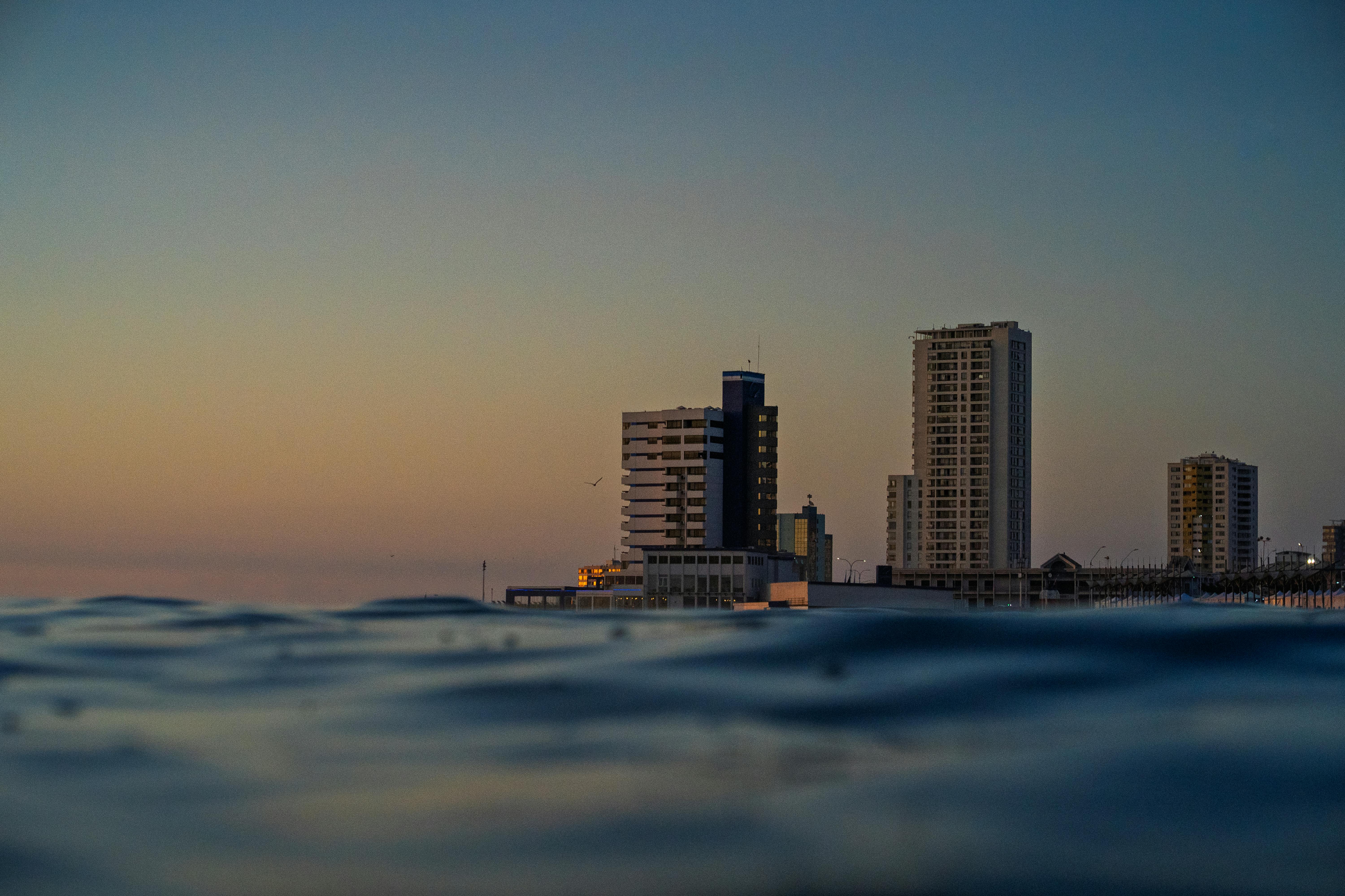 Dramatic sunset over Iquique's skyline along the Pacific coast, Chile.