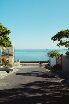 Tranquil seaside view with a clear sky in Bình Thuận, Vietnam. A perfect summer escape.