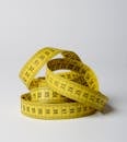 Close-Up Photo of Yellow Tape Measure