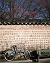 Bicycle Parked Against Traditional Korean Wall