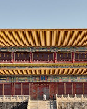 A stunning view of the colorful gate at the Forbidden City in Beijing, China, showcasing traditional architecture.