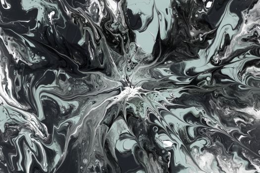 Dynamic black and white abstract fluid art with swirling patterns and intricate details.
