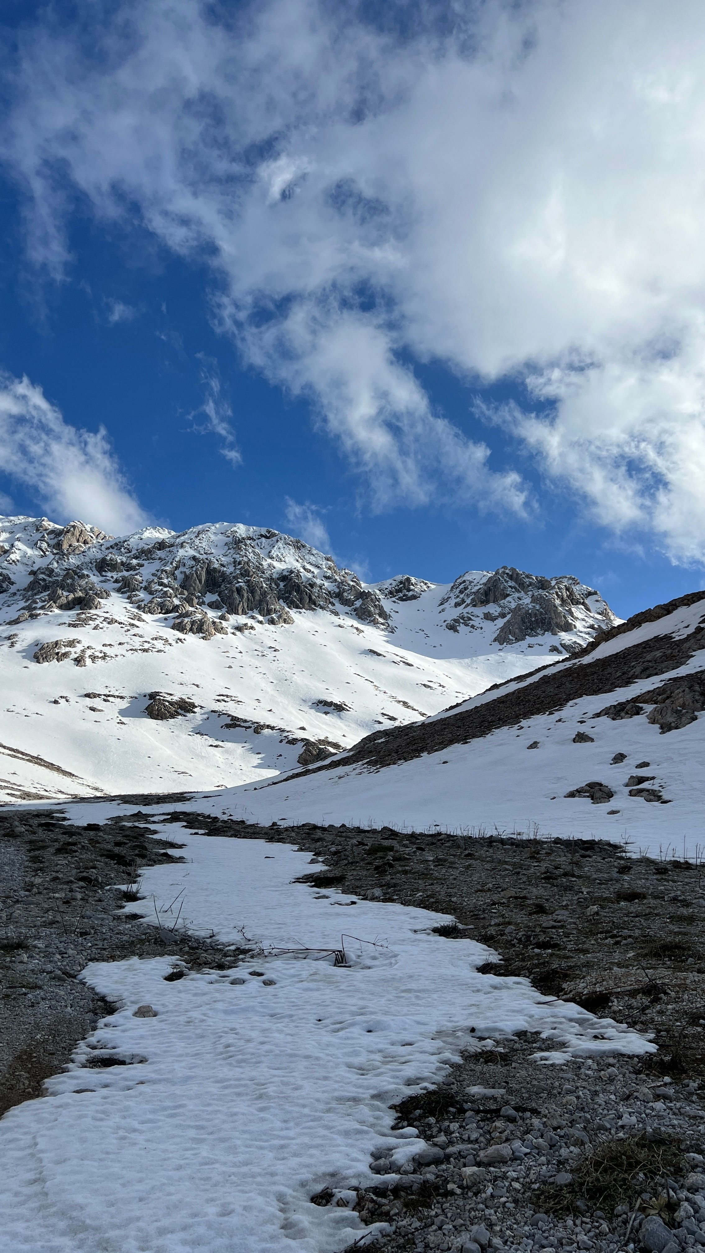 Snow-Capped Mountains Under a Clear Blue Sky · Free Stock Photo
