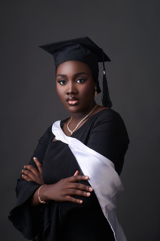 Graduate in cap and gown